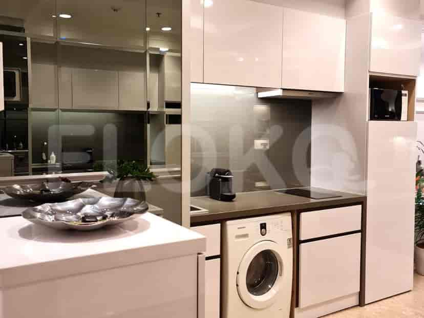 Modern kitchen with white cabinets.