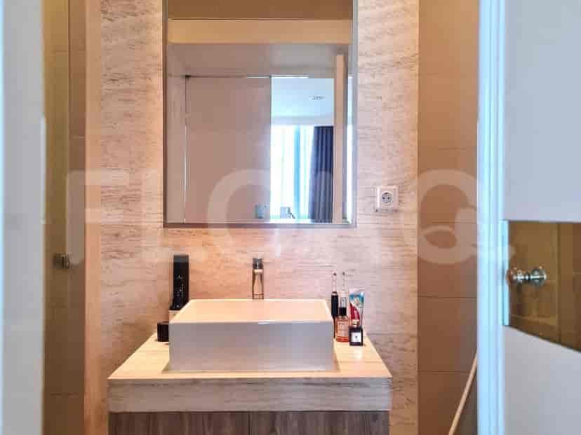 Bathroom with a sink and mirror.