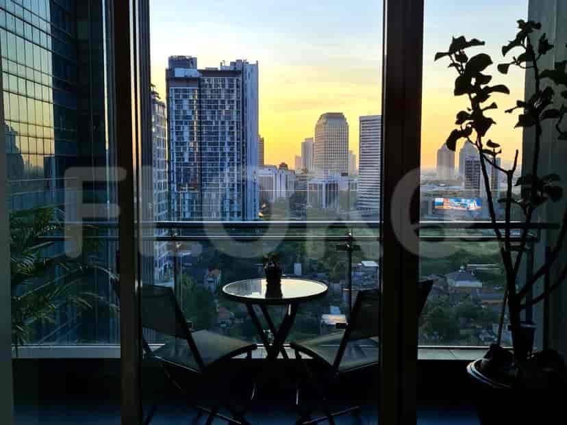 Balcony overlooking city view.