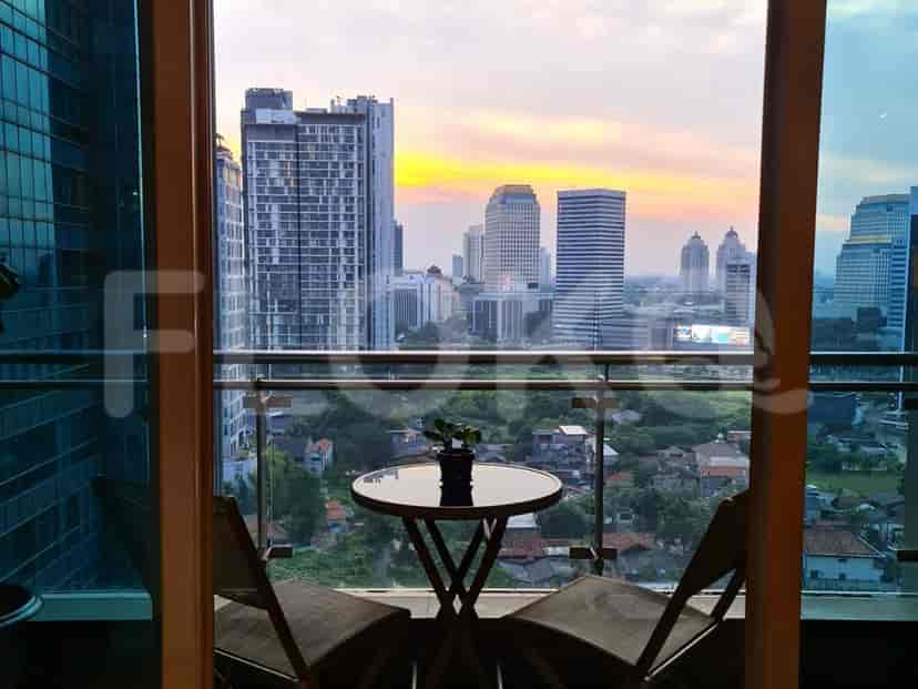 Balcony overlooking city view.