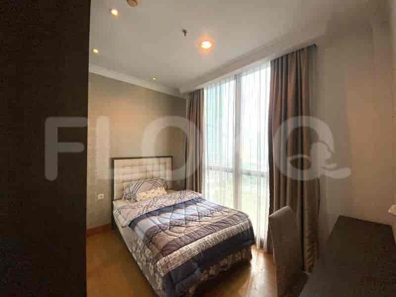 Cozy bedroom featuring a double bed and window.
