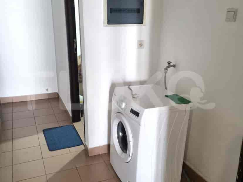Laundry room with a washing machine.