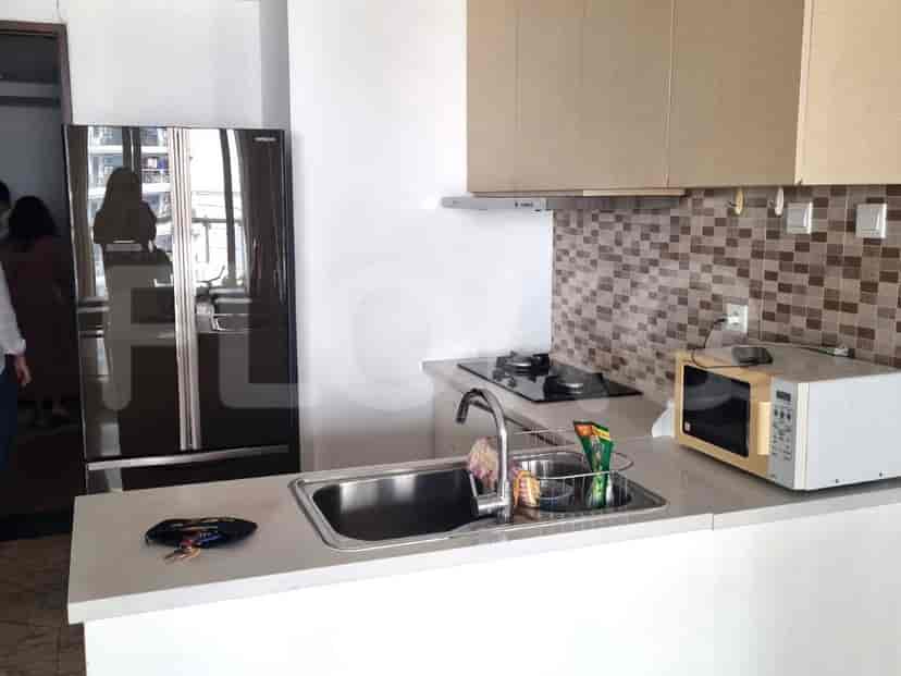 Kitchen area with appliances and countertop space.