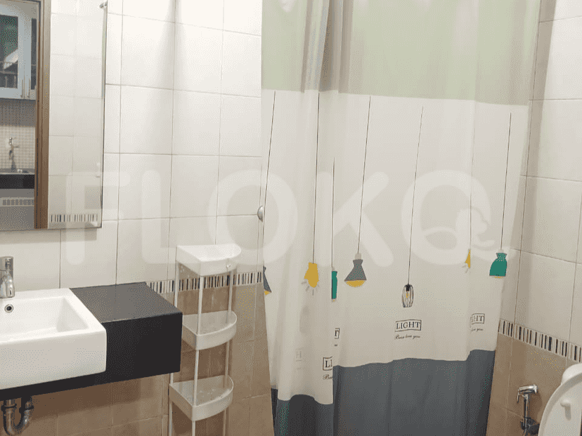 Bathroom with shower and sink.