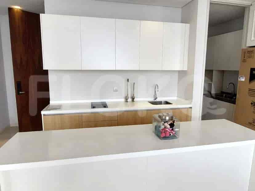 A kitchen with a countertop and cabinets.