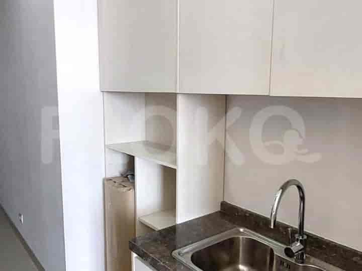 A bathroom with a sink and a shower.