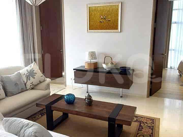 Living room with sofa and a painting.