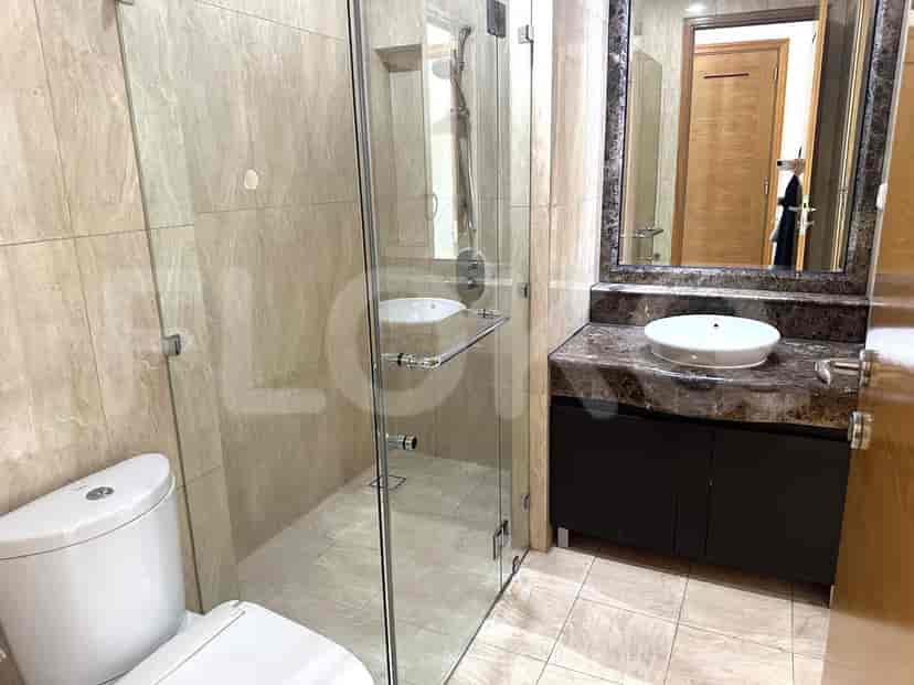 Modern bathroom with a shower and a toilet.