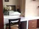 A study area with a desk and chair.