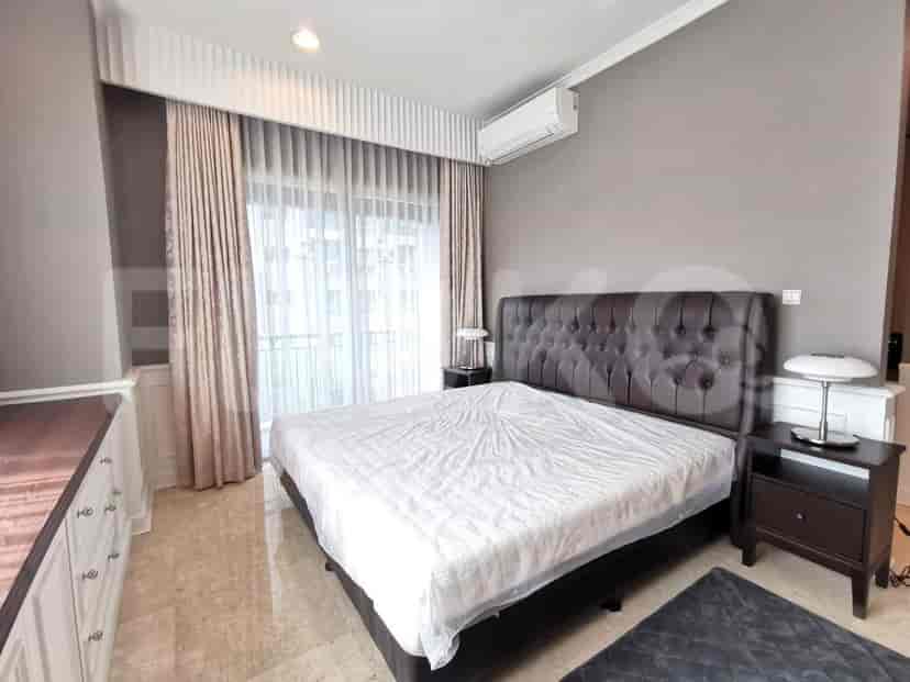 Bedroom featuring two single beds with an attached headboard.