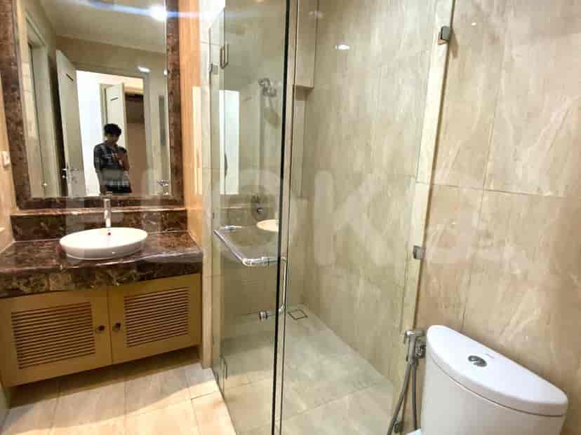 Bathroom with a sink, mirror and shower.