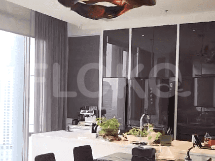 Kitchen area with high ceilings and a view of the city.