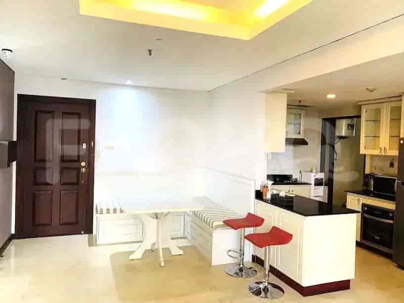 An open-concept dining and kitchen area with a breakfast bar.