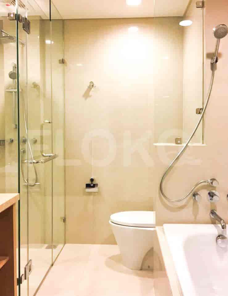 Bathroom with a shower, toilet and bathtub.