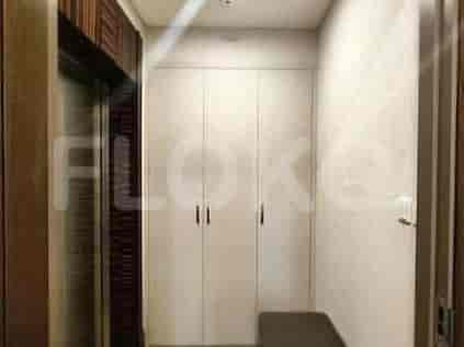 A hallway featuring storage solutions and access points.