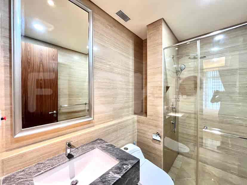 Bathroom with shower, sink, and toilet.