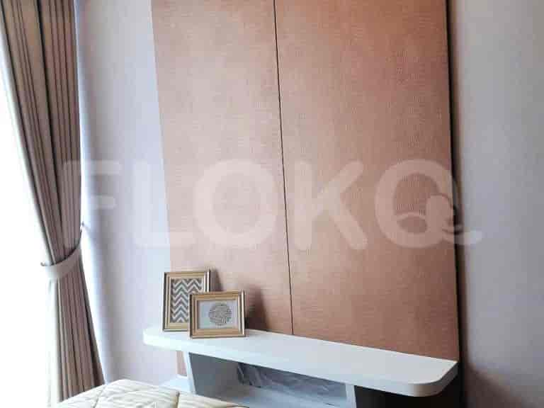Close-up of bedroom, showcasing design elements and artwork.