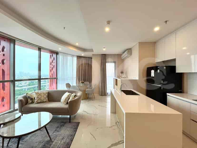 Modern open-plan living room and kitchen with city views.