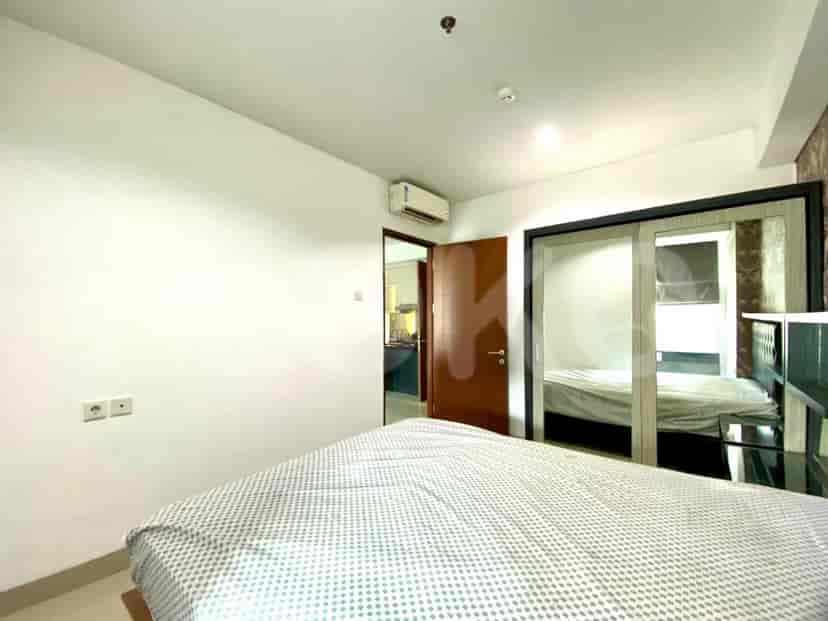 Kamar tidur yang nyaman dengan pemandangan dapur.