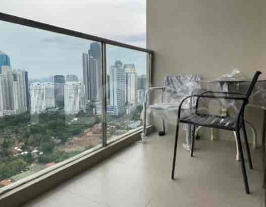 Balcony overlooking a cityscape.