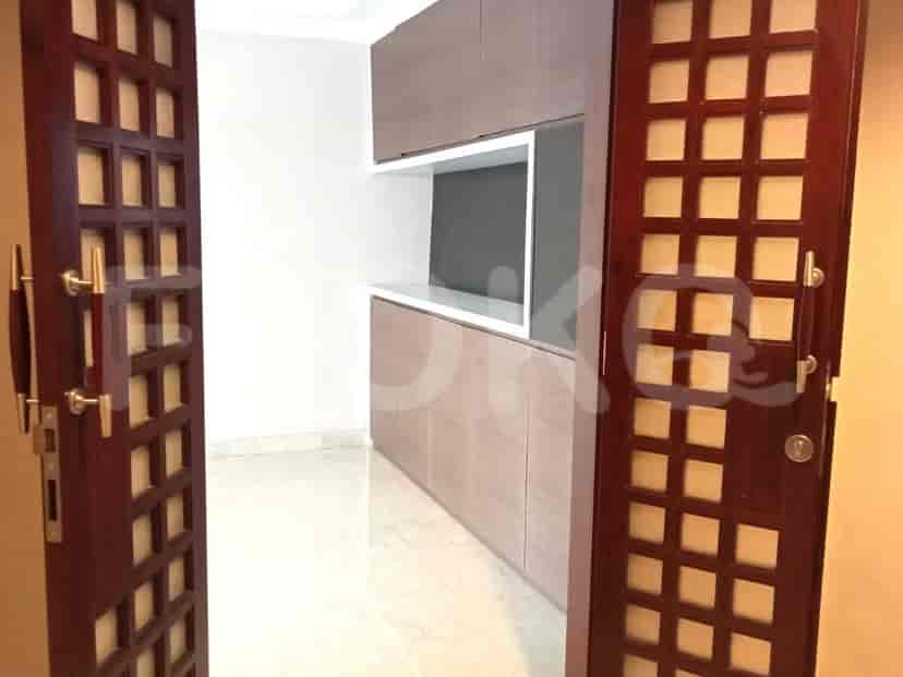 Entryway with doors to different rooms.