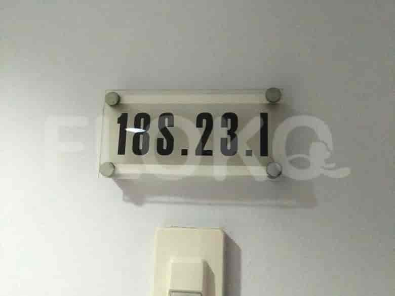 The unit number plate, 18S.23.1.