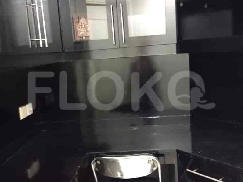 Dark modern kitchen with cabinets.