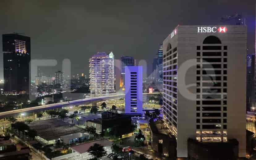 Nighttime cityscape view from the apartment.