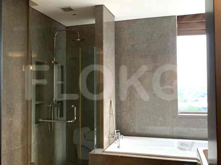 Bathroom interior with a shower and bathtub.