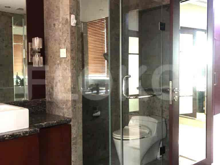 Bathroom with a shower and a toilet.