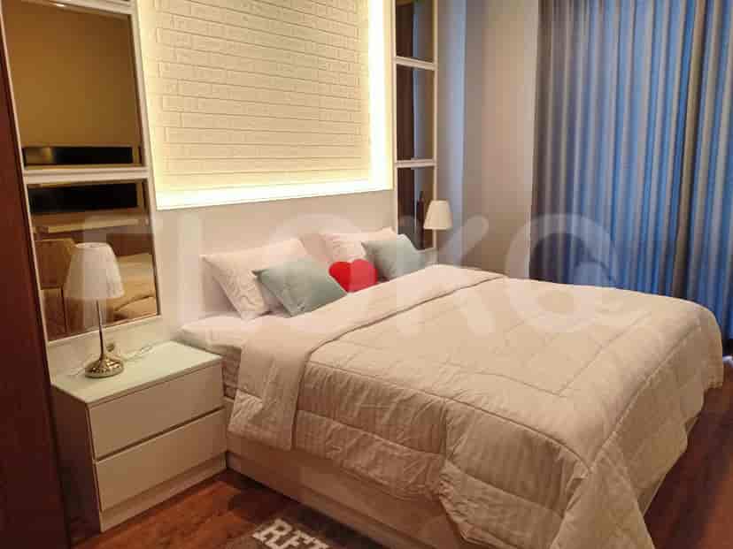 Contemporary bedroom with a comfortable bed and stylish decor.