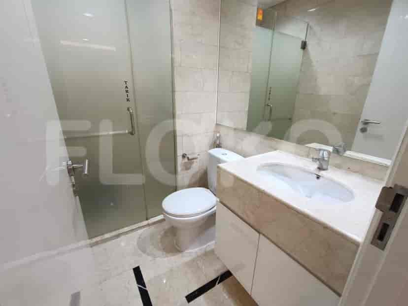 Modern bathroom featuring a glass shower and contemporary fixtures.