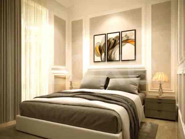 Modern bedroom with a large bed, bedside tables, and artwork.