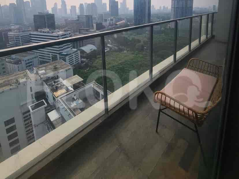 Balcony with city views and outdoor seating.