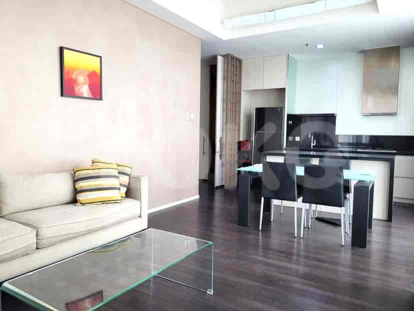 Open living space showcasing a dining area and access to the kitchen.