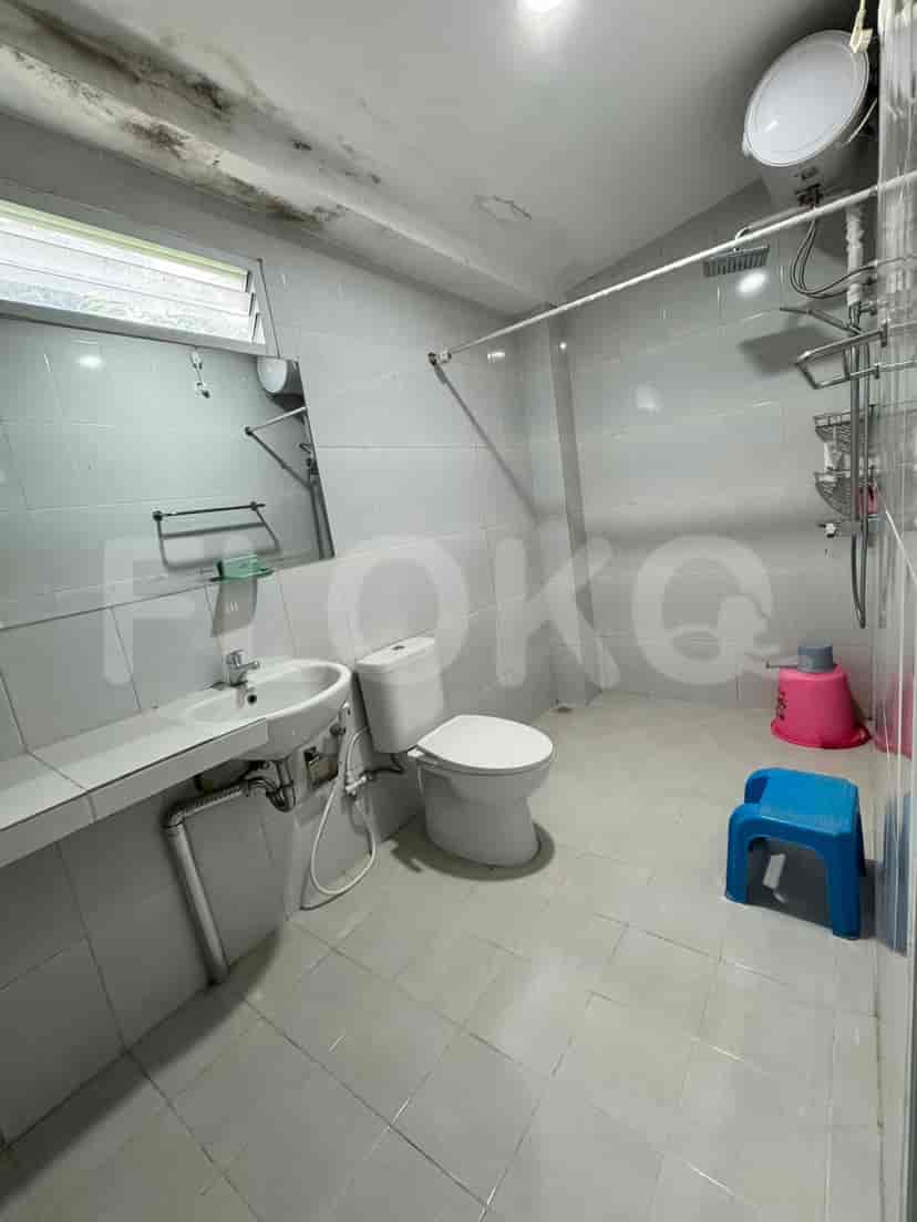 Bathroom with shower and toilet.