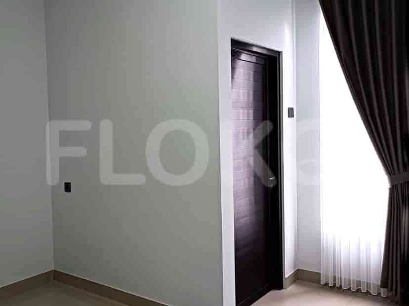 An interior room with a closed door.