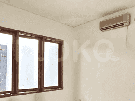 Bedroom with window and split AC.