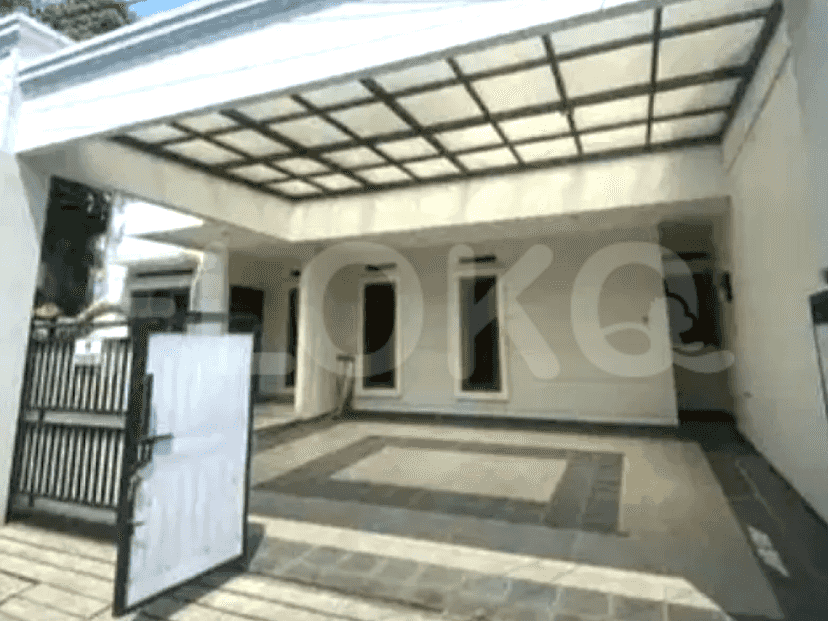 A modern house with a carport, tiled flooring, and a black metal gate.