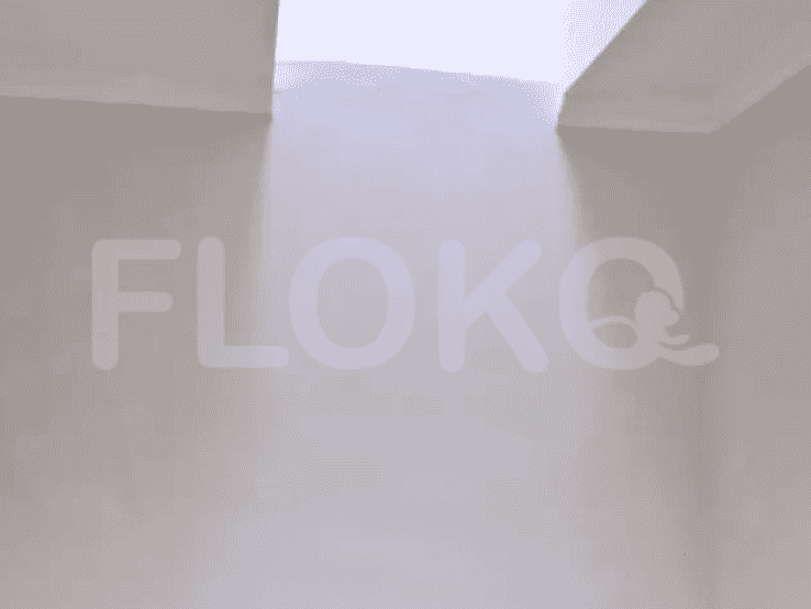 An empty space with white walls and a white ceiling.