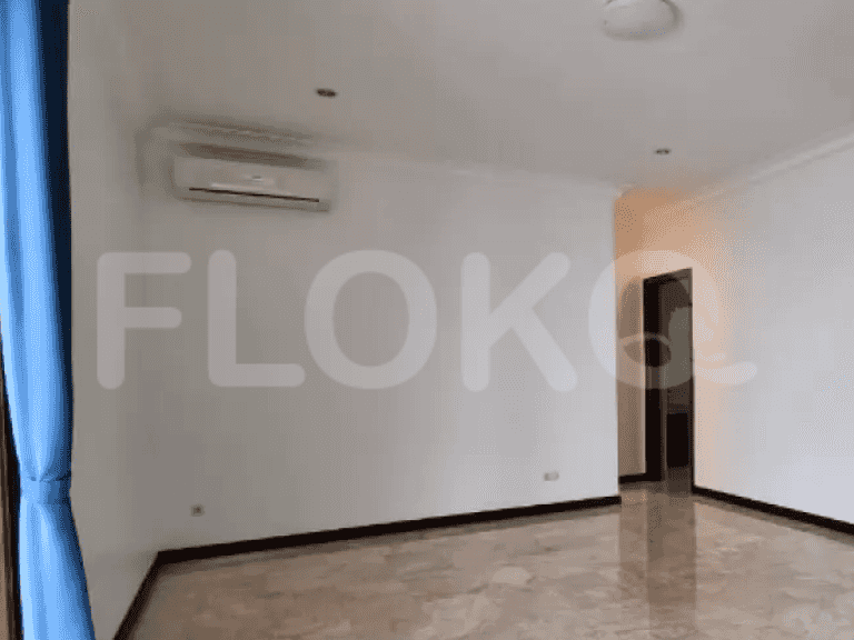Living room showcasing marble floors, air conditioning, and a bright, airy atmosphere.