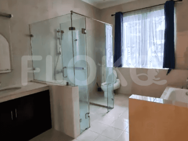 A bathroom featuring a walk-in shower with glass enclosure, a bathtub, and a vanity unit.