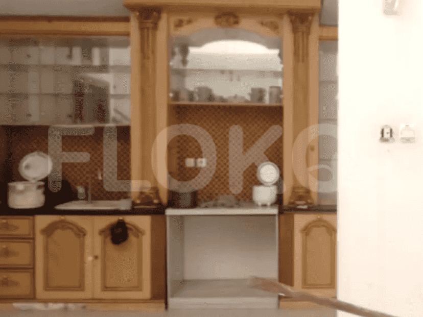 A well-equipped kitchen with wooden cabinets, stainless steel appliances, and a sink.