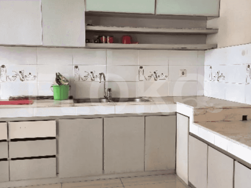 A kitchen with cabinetry, countertops, and appliances.