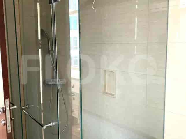 Shower area with a glass enclosure.