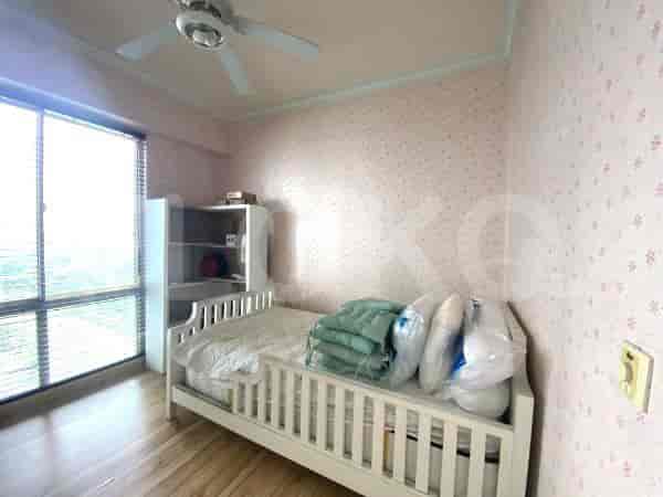 Bedroom with a single bed, window, and floral wallpaper.