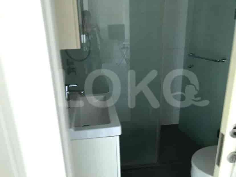 Modern bathroom with a sink and shower.