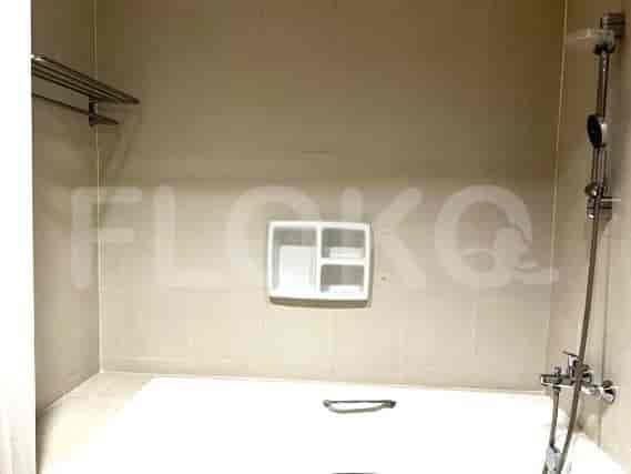 Bathroom with a bathtub and shower fixtures.