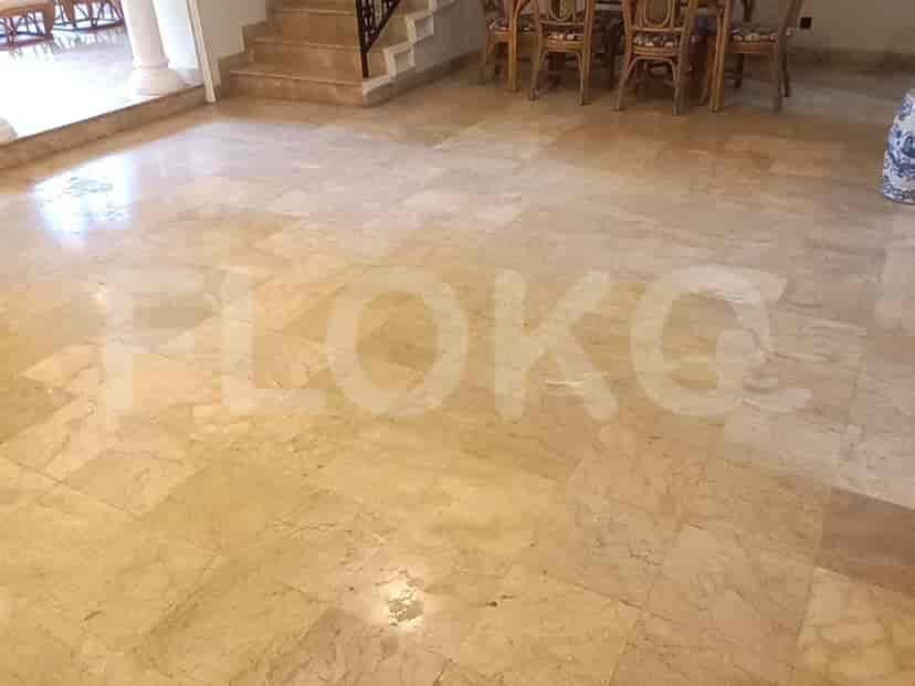 Hallway with marble flooring.