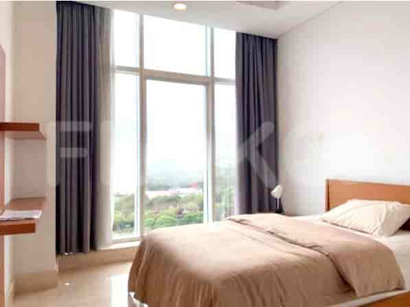 Bedroom with a bed and large window